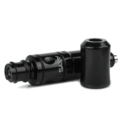 Black Axys Valhalla Pen a Tattoo Pen Machine laying on a tabletop.  