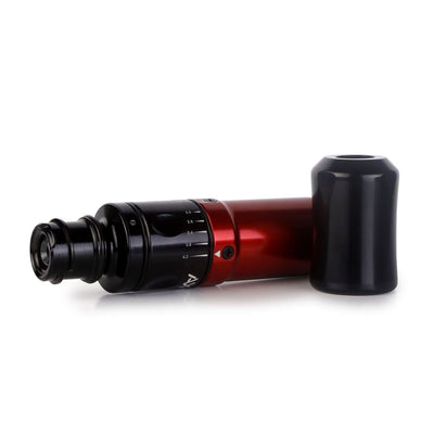 Red Axys Valhalla Pen Tattoo Machine laying on a tabletop.   